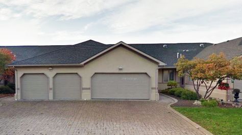 Snout houses are homes dominated by large garages, often found in Windsor's newer neighbourhoods. City planners say this style of home should be discouraged in new developments. Snout House, Sense Of Community, City Planner, White Dove, White Doves, Urban Design, Windsor, Shed, The Neighbourhood