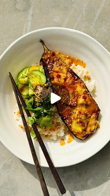 Amelia Ferrier on Instagram: "CHEESY CARAMELISED MISO EGGPLANT! Only 5 ingredients too (NOT including oil lol) - perfect savoury and sweet combination. Cooking the eggplants cut side down traps all the steam under the skin as they cook, making the flesh super tender and silky. Recipe below! Inspired by the delicious ones you get from Nishiki in Ponsonby! 

2 medium-sized eggplants, cut in half lengthways 
3 Tbsp each miso paste & mirin 
1 Tbsp caster sugar 
75g mozzarella cheese, shaved 
Sesame oil, for drizzling 

Preheat your oven to 220°C fan bake. Line a medium baking dish with baking paper. 
Score the cut side of the eggplants in a crosshatch pattern, roughly 1 cm deep. Season with salt. Drizzle some sesame oil over the lined baking dish and place the eggplants, cute side down, into t Miso Eggplant, Miso Paste, Under The Skin, The Flesh, Caster Sugar, Baking Paper, Baking Dish, Sesame Oil, Mozzarella Cheese