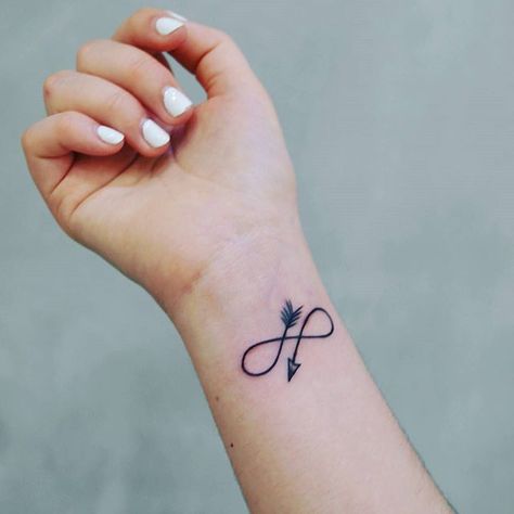 Infinity Tattoo Meaning, Infinity Arrow Tattoo, Small Infinity Tattoos, Arrow Tattoo On Wrist, Infinity Tattoo On Wrist, Infinity Tattoo Designs, Shape Tattoo, Infinity Tattoos, Small Wrist Tattoos