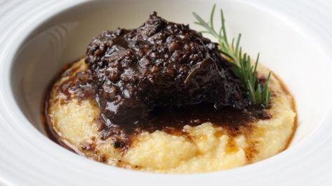 Beef short ribs with lots of black pepper, red wine, and fresh herbs is rich, flavorful, and fork tender when braised for hours over low heat. Italian Fish Stew, Tuscan Cooking, Black Pepper Beef, Pepper Beef, Tuscan Recipes, Chef John, Best Italian Recipes, White Bean Soup, Homemade Italian