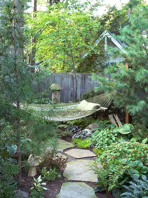 making your entire yard a private paradise, take one corner and transform it into a secluded getaway. A redbud just behind the hammock enhances the effect. Backyard Hammock, Outdoor Hammock, The Secret Garden, Landscape Projects, Garden Cottage, Garden Spaces, Backyard Oasis, Shade Garden, Dream Garden