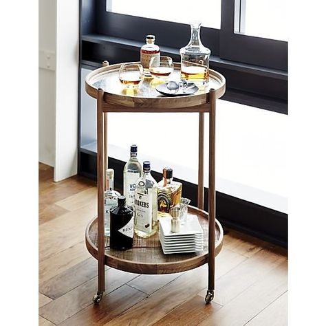 The party may start in the kitchen, but it doesn't usually stay there. A bar cart is one of the prettiest ways to keep the cocktails flowing and the party going in more comfortable rooms of the home. Here are 11 bar carts with good looks and proper wheels to help your soiree roll along late into the night. Small Bar Cart, Gold Bar Cart Target, Gold Bar Cart Styling, Round Bar Cart, Cocktail Trolley, Diy Bar Cart, Bar Cabinets, Gold Bar Cart, Modern Contemporary Homes