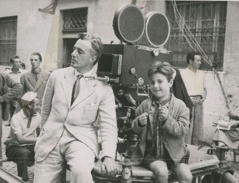 Vittorio de Sica and Enzo Staiola filming Bicycle Thieves (1948) Bicycle Thieves, Italian Neorealism, Werner Herzog, Lunatic Asylum, Marcello Mastroianni, Movie Directors, Foreign Film, Music Books, Film History