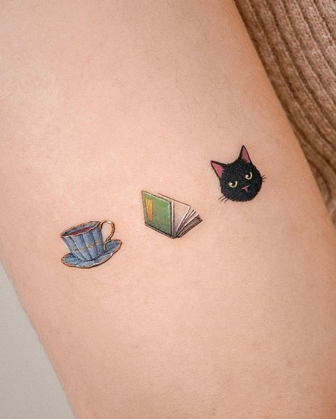 Colour Book Tattoo, Cat Book Tea Tattoo, Umbrella Tattoo Ideas, Book Tea Tattoo, Coffee Books Tattoo, Frog Reading A Book Tattoo, Wrist Book Tattoos, Cookbook Tattoo, Textbook Tattoo