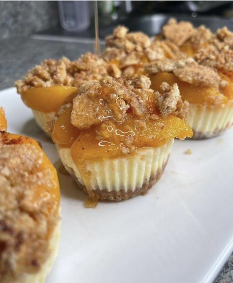 Peach Cobbler Cheesecake Mini Peach Cobbler Cheesecake, Peach Cobbler Cheesecake Bites, Peach Cobbler Cheesecake Recipe, Mini Peach Cobbler, Peach Cobbler Cheesecake, Peach Cheesecake, Athletic Chic, Peach Cobbler Recipe, Cheesecake Bites