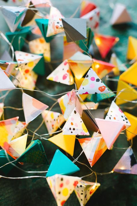 Folded Paper Decorations, Origami Garland Diy, Paper Lantern With Fairy Lights, Light Garland Diy, Origami Fairy Lights Diy, Origami Lights Diy, Origami Triangle, Paper Lantern String Lights, Diy Garland Paper