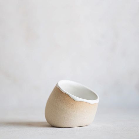 This open-top ceramic salt cellar holds a generous amount of sea salt and sits on a gentle pivot for convenient access. The exterior has been left raw to appreciate the raw beauty of this buff stoneware, and the interior has been glazed with a soft white satin glaze. KINDLY NOTE: Variations in glaze color, size, and finish are to be expected, this adds to the charm! approximate size: 3.5" wide, 2.5" tall dishwasher-safe, although we recommend handwashing to extend the life of your tumbler each p Ceramic Salt Dish, Pottery Salt Cellar, Ceramic Salt Cellar, Salt Pig Pottery, Salt Pig Ceramic, Handmade Ceramic Salt Cellar, Brooms And Brushes, Ceramic Accessory, Ceramics Inspiration