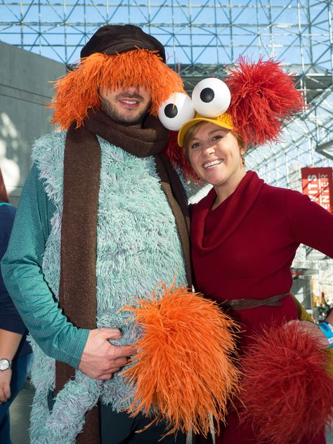 https://flic.kr/p/A8mbgT | Raggle Frock | Terrific interpretations of Boober and Red, of "Fraggle Rock." I like how the costumes are unapologetically "wearable human clothes" that quote everything important about the design of those two characters. Is there a "golden radio" of pupil to eyeball that makes something instantly recognizable as a Muppet? Because those eyes are spot-on. Literally. Fraggle Rock Costume, Red Fraggle Rock, Rock Costume, Muppets Party, Puppet Costume, Halloween Party Planning, Character Halloween Costumes, Fraggle Rock, Diy Kostüm