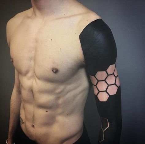 These Striking Solid Black Tattoos Will Make You Want To Go All In - KickAss Things Blackout Tattoo Ideas, Black Sleeve Tattoo, Solid Black Tattoo, White Tattoos, Full Tattoo, Blackout Tattoo, Traditional Tattoo Sleeve, Biomechanical Tattoo, Magic Tattoo