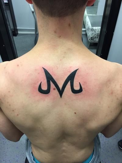 Majin Vegeta Tattoos #majinvegetatattoos #dragonballtattoo #majinvegeta #majin Vegeta Symbol Tattoo, Majin M Tattoo, Majin Tattoo Ideas, Majin Symbol Tattoo, Majin Boo Tattoo, Vegeta Tattoo Ideas, Dbz Tattoo Ideas, Tatuaje Dragon Ball, Majin Buu Tattoo