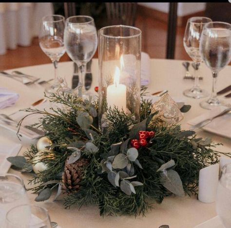 Simple Winter Centerpieces Wedding, Xmas Wedding Centerpieces, Pointsetta Wedding Centerpieces, Pine Table Centerpiece, Sweetheart Table Wedding Christmas, Winter Flower Centerpieces, Christmas Wedding Round Table Decor, February Wedding Centerpieces, Winter Sweetheart Table Wedding