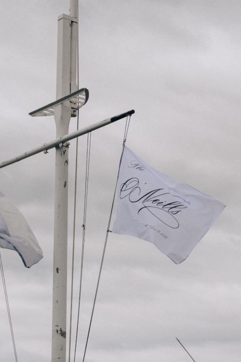 Custom Monogram Boat Flags For Coastal Wedding #WeddingChicks #boatwedding #coastalwedding #weddingflags #customflags #monogramflags Boat Wedding Reception, Sailing Wedding, Sailboat Wedding, Wedding Flags, Boat Flags, Sailboat Decor, Boat Signs, Carmel Weddings, Hamptons Wedding