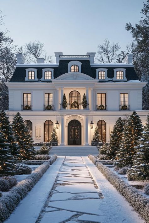 Front view of a French mansion in winter white facade with columns and arches black multi pitched roof with dormers large front entrance with. These charming winter house exteriors capture the spirit of the season. Prepare to fill your heart with seasonal warmth. Exterior View Of House, Large Brick House, Gallery Home Design, Stone Houses Exterior, House With Pillars, Parisian House Exterior, Roofs Of Houses, House With Roof, White Facade