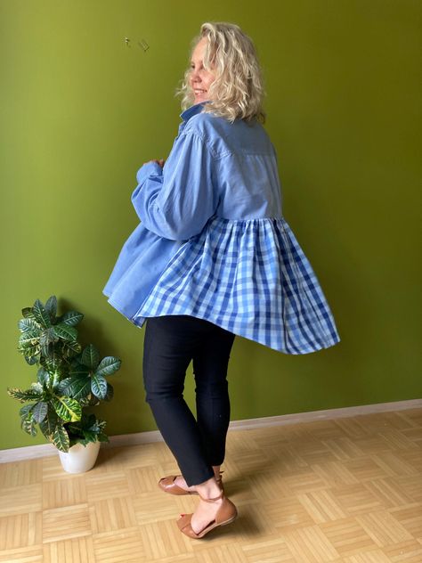 Elevate your wardrobe with this unique upcycled denim blouse, featuring a charming gingham back panel. This one-of-a-kind piece combines comfort, style, and sustainability, making it the perfect addition to any eco-conscious fashion lover's collection. Features: 🧵 Handcrafted: Lovingly upcycled from pre-loved denim shirts, each blouse is transformed into a unique piece with a fresh, modern twist. 👗 Charming Gingham Detail: The back of the blouse features a vibrant gingham pattern, adding a playful and eye-catching element to the classic denim shirt design. 🛋️ Oversized Fit: Designed for a relaxed, comfortable fit, this blouse is perfect for layering or wearing on its own. Its loose silhouette flatters a variety of body types. ♻️ Eco-Friendly: By choosing this upcycled blouse, you're sup Upcycle Clothing, Upcycle Shirt, Denim Shirts, Big Shirt, Gingham Fabric, Denim Blouse, Upcycled Denim, Eco Friendly Fashion, Upcycle Clothes