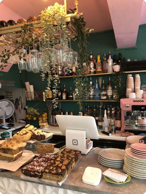 Pink And Green Cafe Interior, Lunchroom Aesthetic, Green And Pink Coffee Shop, Plant Cafe Interior, Whimsical Coffee Shop, Cozy Cafe Design, Cafe With Plants, Cute Cafe Interior, Pink Cafe Aesthetic