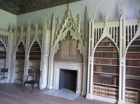 Bookcases with pierced Gothic arches in the Library Gothic Arch Bookcase, Gothic Shelving, Witchy Mansion, Alter Room, Gothic Bookshelves, Vampire Bedroom, Gothic Bookcase, Victorian Office, Gothic Library