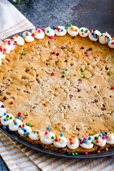 An easy and delicious recipe for Giant M&M Cookie Cake is best served warm with a scoop of ice cream.  Crisp edges and a chewy, gooey center are what make this extra-large cookie recipe the best! It's perfect to share with friends and family on any occasion. M&m Cookie Cake Recipe, Big Cookie Recipe, Giant Cookie Recipe, Giant Cookie Cake, Ultimate Chocolate Chip Cookie, Scoop Of Ice Cream, Pan Cookies, M M Cookies, Cookie Pizza