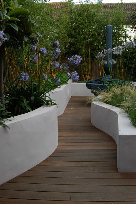 Curved raised beds leading to seating area| Town Garden Osterley | Breeze Garden Design Garden Design Ideas Inspiration, Garden Design Ideas On A Budget, Town Garden, Garden Seating Area, Raised Patio, Backyard Garden Layout, Front Garden Design, Tiered Garden, Back Garden Design