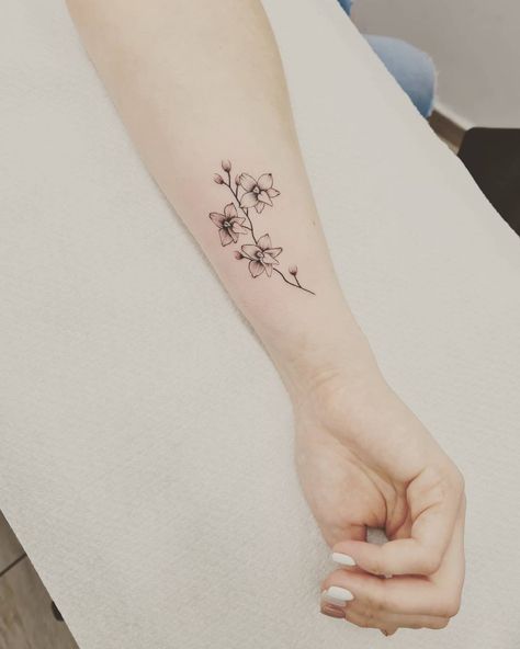 10 Best Orchid Tattoo Ideas You Have To See To Believe! | Outsons | Men's Fashion Tips And Style Guides White Orchids Tattoo, Line Art Orchid Tattoo, Orchid Forearm Tattoo Women, Small Orchid Tattoo Simple, Orchid Tattoo Black And White, Mini Orchid Tattoo, White Nun Orchid Tattoo, Black And White Orchid Tattoo, Orchid Arm Tattoo