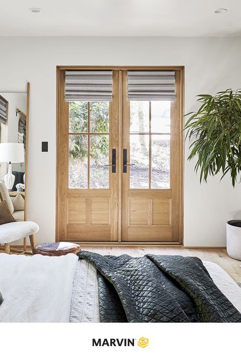 Emily Henderson used Marvin windows and doors to bring natural light into this space. These white oak doors balance out the neutral colors to achieve a soft yet subtly moody guest suite.  

📷: Sara Tramp for EHD. Blackout Shades, Emily Henderson, Hunter Douglas, Oak Doors, Dining Nook, Guest Bed, Wood Ceilings, Mountain Home, Guest Bath