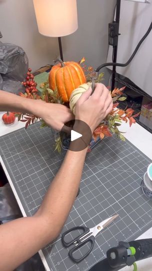 40K views · 423 reactions | Super cute fall arrangement that can be removed from my container after the season! ￼ | By How I See It Blog, LLC | It's pumpkin time and in this
video I'm going to be using a container that I'd love and I'm
going to be making a quick and simple arrangement in this that
can easily be removed y'all. Hey y'all it's Cody here with
how I see it where I inspire you every day to see the world
how I see it. I'm going to be using this blue and white
container and I've cut a piece of foam to nest down into the
container. And I'm not going to be gluing it in there either.
This is a container that I love to use over and over and over
again. Had it for a very long I just wanted to add something to
it to sit on our back porch to add some fall color. So I'm
just going to be g Fall Tables, White Container, Dollar Tree Centerpieces, Chinoiserie Pumpkins, Fall Centerpieces, Pumpkin Decorations, Wire Wreath Forms, Decorative Ideas, Floral Arrangements Diy