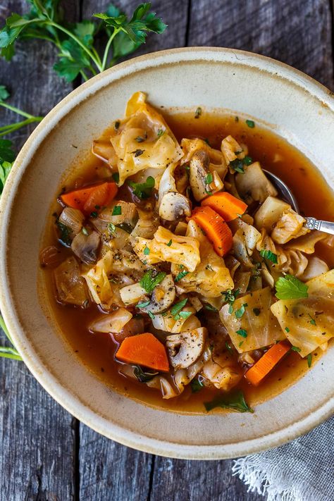 Simple clean ingredients full of comforting flavors, this Cabbage Soup is healthy, satisfying and easy to make. Perfect for busy weekdays and leftovers are delicious! Vegan. Simple Cabbage Soup, Vegetarian Cabbage Soup, Easy Cabbage Soup, January Recipes, Feasting At Home, Cabbage Stew, Baked Mushrooms, Plantbased Recipes, Vegetarian Cabbage