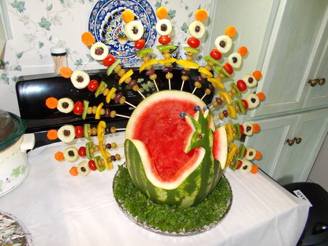 Watermelon  I carved into a peacock filled with watermelon cubes and fruit skewers for the tail , for the wedding. Watermelon Cubes, Fruit Creations, Fruit Skewers, Fruit And Vegetable Carving, Vegetable Carving, Fruit Carving, Thanksgiving Dinner, Fruit Bowl, Skewers