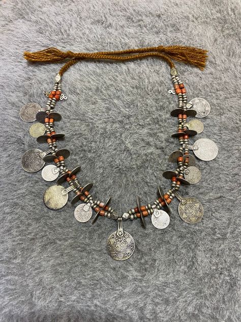 This is an Antique Moroccan Necklace With Old Silver Coins , Small Silver Beads and Natural Coral Beads.    Length : 65,5cm You can reduce or increase the length     Weight : 157g Moroccan Necklace, Old Silver Coins, Oversized Necklace, Silver Coin Necklace, Moroccan Jewelry, Exotic Jewelry, Ethnic Necklaces, Natural Coral, Antique Necklace