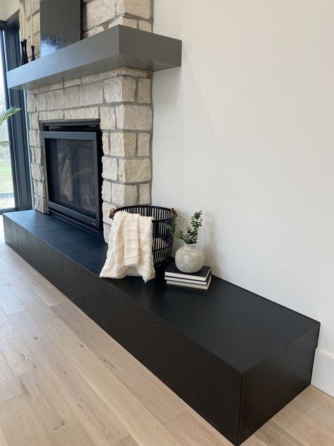 As a design-build custom home architectural firm, we like to push the boundaries and try new materials. This raised hearth is laminated in a non-combustible recycled leather from Laminart. We love the black hearth contrasted against the White Oak hardwood floors. This custom home is built in Springboro, OH. Raised Hearth, Black Hearth, Oak Hardwood Floors, White Oak Hardwood Floors, Architectural Firm, Oak Hardwood Flooring, Fireplace Hearth, Custom Home Designs, Oak Hardwood