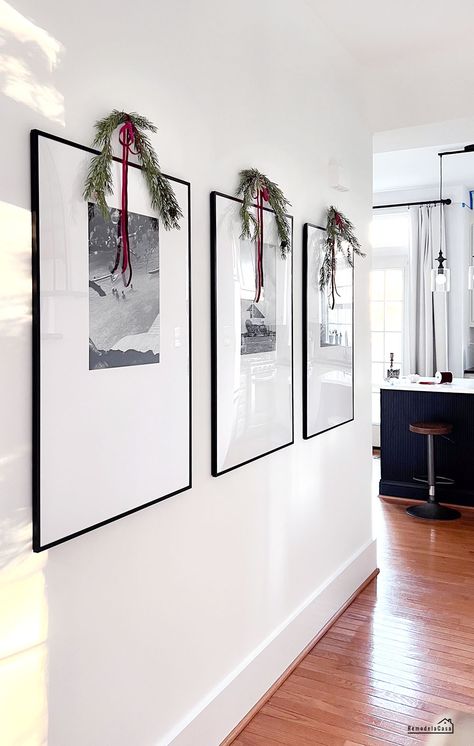 Transforming Your Hallway With A Timeless Black And White Gallery Wall - Remodelando la Casa Black And White Gallery Wall, White Gallery Wall, Hallway Gallery Wall, Burgundy Christmas, Gift Wrapping Station, Holiday Swag, Wrapping Station, Led Curtain Lights, Christmas Attire