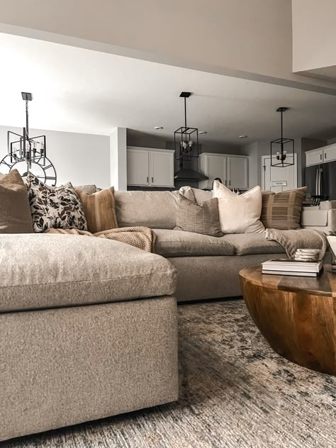 Living Room Tan Sectional, Browns And Beige Living Room, Browns And Cream Living Room, Neutral Sectional Couch, Dark Couch In Living Room, Tan Neutral Living Room, Sectional Living Room Ottoman, Neutral Color Living Room Ideas Cozy, Grey And Oatmeal Living Room