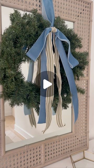 Amy Dusseault | Classic Coastal Home & Style on Instagram: "Here is my attempt at a perfect classic “floppy” Christmas bow video tutorial using my favorite Amazon velvet ribbon. 

I hope this is somewhat helpful - I was limited with the time allowed for a reel - but hopefully you are able to see the steps OK. I’ve included the written steps below as well.

Please comment or DM me with any questions! Happy bow making! 

Step 1: 

Cut 2 pieces of the ribbon you are using and lay flat. You will want to decide how long based on how long you want your “tail” & “bow” to be.

(If you fold one in half - that will give you an idea of how long the tail will be.)

Step 2: 

Take one of the pieces and fold it into a ring or loop - with the 2 ends overlapping by at least 2 inches.

This will become the Droopy Bows On Wreaths, Floppy Bows Diy, How To Tie A Big Bow For A Wreath, Tieing A Wreath Bow, Bow Placement On Wreath, Wreath Side Bow, How To Tie A Floppy Velvet Bow, Loop And Tail Ribbon Christmas Tree, Wreath Bow Tutorial Step By Step