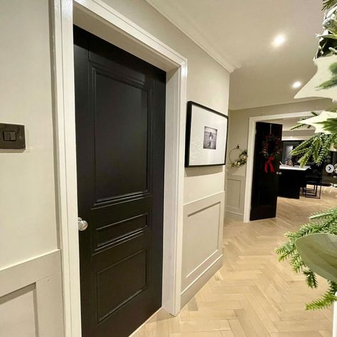 Black panelled internal door Black Doors And Skirting Boards, Internal Black Doors, White Hallway Black Doors, Black Doors Hallway, Black Door Hallway, Hallway Black Doors, Hallway With Black Doors, Black Hallway Doors, Modern Edwardian Interiors