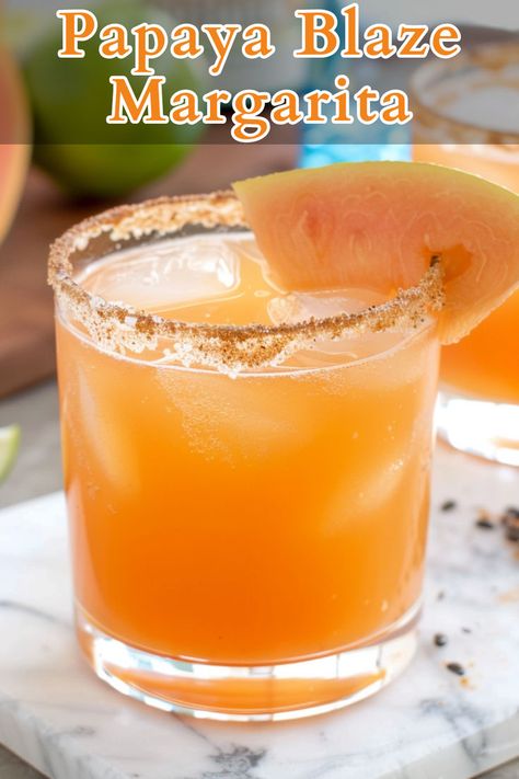 The Papaya Blaze Margarita is a vibrant and spicy cocktail that combines the tropical sweetness of papaya with the bold flavors of tequila, triple sec, and fresh lime juice. Tequilla Sunrise, Spicy Cocktail, Tequila Drinks, Chipotle Pepper, Tequila Cocktails, Triple Sec, Punch Recipes, Fresh Lime, Fresh Lime Juice