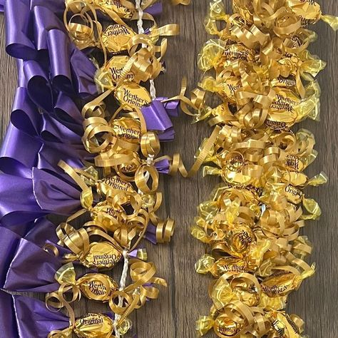 Make It Megan on Instagram: "✨New tutorial! Graduation season is here 🎓. Our new Youtube tutorial shows how to make 3 leis using hard candy 🍬 It is linked in our bio or check it out on our Youtube channel - Make It Megan 🌺♥️⁣ ⁣ ⁣ ⁣ ⁣ ⁣ ⁣ ⁣ ⁣ ⁣ ⁣ #candylei #graduationlei #graduationleis #candyleis #ribbonlei #ribbonleis #moneyleis #hawaiianleis #graduation2023" How To Make A Candy Lei, Candy Leis For Graduation, Graduation Candy Lei, Candy Lei, Graduation Candy, Ribbon Lei, Graduation Leis, Hawaiian Lei, Hard Candy