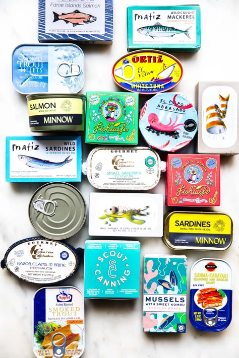 Tinned fish: It’s not a trend—it’s a lifestyle. Tin Fish Pairings, Canned Fish Board, Canned Fish Charcuterie, Tin Fish Packaging, Tinned Fish Charcuterie Board, Fishwife Tinned Fish, Tin Fish Board, Tin Fish Art, Tinned Fish Art