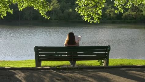 Reading Girl on a Bench in the Park by artur-dz Reading girl on a bench in the park under the trees near the lake Sitting On Park Bench Aesthetic, Sitting On Bench Reference, Person Sitting On Bench, Park Bench Aesthetic, People Sitting On Bench, Park Bench Photography, Bench Aesthetic, Reading In The Park, Bench Photography