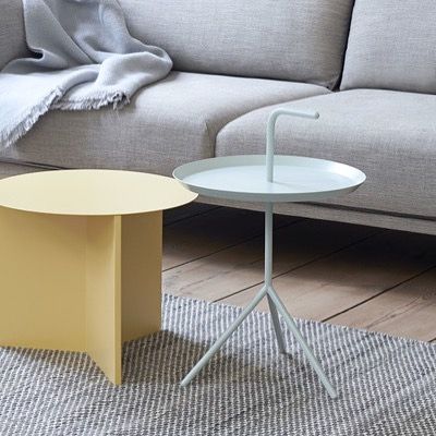 The ‘Don’t Leave Me’ table, abbreviated to DLM, features a convenient handle that allows the metal table to be carried from room to room. Available in mint in store! Hay Table, Hay Side Table, Japanese Paper Art, Grey Side Table, Origami Techniques, Grey Metal, Slim Frame, Scandinavian Minimalism, Metal Side Table