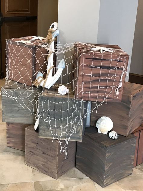 Pirate Ship Party Decor, Treasure Island Theme Party, Treasure Island Party Decorations, Pirate Window Display, Breaker Rock Beach Photo Booth, Pirate Ship Decorations Diy, Diy Shipwreck Decor, Shipwreck Party Theme, Vbs 2024 Decorations