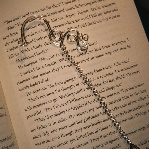 Bookmarks are here!📚 Do you find yourself always with a book on your hands, traveling from one world to another? These bookmarks will sure remind you of all the adventures you’ve been on with your favorite books⚔️ Wire wrapped bookmarks with beautiful charm chains because a lovely book spine deserves a stunning charm chain, just like we deserve stunning jewelry!🌞 🌻 DM for details 🌻 #bookmarks #handmade #wirewrapping #wirewrap #bookstagram #booklover #bookaddict Wire Bookmarks, Book Spine, Charm Chain, Bookmarks Handmade, Find Yourself, Book Addict, Stunning Jewellery, Pretty Jewellery, First World