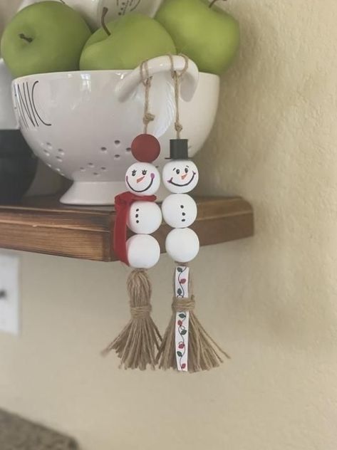 THIS LISTING IS FOR:-SET OF TWO: Natural Wood Bead Garland with twine tassel -8" each overall-25 and 30 mm beads-Snowman design - hand drawn! • • • • • • • • • • • • • • • • • • • • • • • • • • • • • • • • • Check out my awesome reviews from my amazing customers!• • • • • • • • • • • • • • • • • • • • • • • • • • • • • • • • • Introducing our Farmhouse Snowman Garland! What a beauty for your Christmas decor! This garland is a beautiful farmhouse rustic addition to your home! So cute! The will lo Snowman Garland, Farmhouse Snowman, Rustic Baby Shower Decorations, Wood Garland, Xmas Bells, Wood Beads Diy, Diy Christmas Ornaments Easy, Wooden Bead Garland, Beautiful Farmhouse