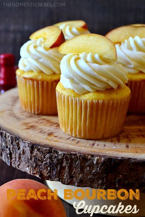 These Peach Bourbon Cupcakes couldn't be easier or more impressive to whip up! Moist and tender peach cupcakes topped with a bourbon-infused real peach buttercream frosting. So great for when peaches are in season and extra ripe! Peach Buttercream, Bourbon Cupcakes, Cupcake Topping, Bourbon Cake, Peach Bourbon, Infused Cupcakes, Peach Cupcakes, Boozy Cupcakes, Boozy Desserts