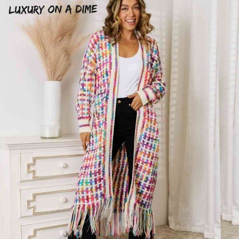 Retro Knit Bright Colorful Fringe Hem Longline Duster Sweater Cardigan Rainbow (Plus Size Available) This Cozy Upgraded Classic Longline Cardigan Is A Timeless Wardrobe Staple. Effortless Pairing With Your Favorite Tops And Jeans. The White Knit With Contrasting Bright Bold Colors Will Add That Touch Every Outfit Is Missing. Fringe Bottom Hem Gives A Bohemian Retro Vintage Vibe. Open Front With Long-Sleeves Featuring A Ribbed Trim. Perfect Sweater Jacket For Fall & Winter Shopping, At The Office