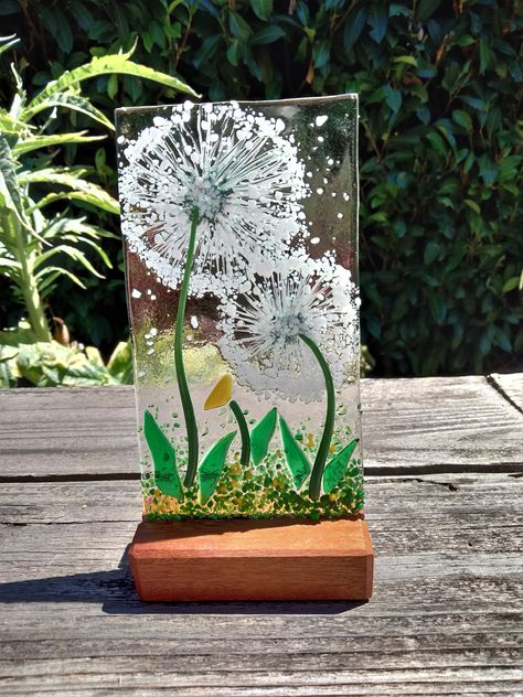 Brand new fused glass dandelion just added to my site http://www.etsy.com/shop/2grayhares. Fused Glass Dandelion, Fusing Glass Ideas, Glasfusing Ideas, Frit Painting, Broken Glass Crafts, Stained Glass Night Lights, Fused Glass Wall Art, Fused Glass Bowl, Glass Art Pictures