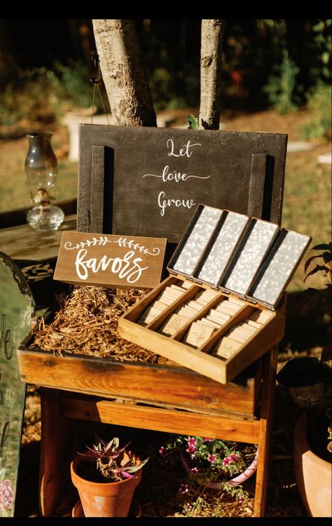 Wedding favors display- “let love grow” seed packets Wedding Favors Display, Wedding Seed Packet Favors, Favor Display, Seeds Gifts, Seed Packets Favors, Seed Favors, Let Love Grow, Wedding Shower Themes, Seed Wedding Favors