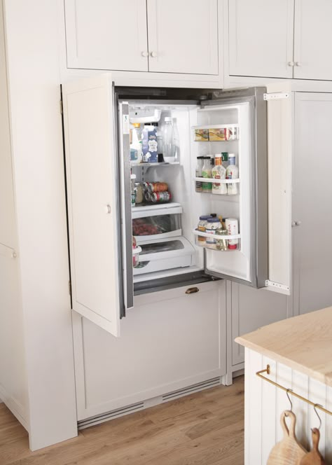 We're sharing how we turned our regular refrigerator into an integrated (panel) refrigerator, without spending a lot of money! #diy #kitchen #panelrefrigerator #integratedrefrigerator Appliance Organization, Fridge Surround, Hidden Refrigerator, Appliances Organization, Carriage House Kitchen, Panel Refrigerator, Hidden Fridge, Refrigerator Makeover, Panel Ready Refrigerator