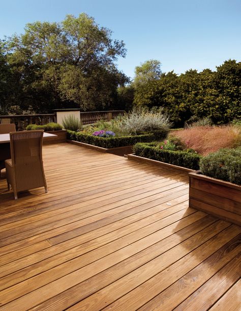 Decking Stain and Protector available in three shades. Deck With Planters, Deck Stain Colors, Garden Decking, Deck Colors, Deck Designs Backyard, Staining Deck, Cool Deck, Timber Deck, Decks Backyard