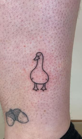 Small Quirky Tattoos For Women, Cool Duck Tattoo, Graphic Designer Tattoo Ideas, Duck Tattoos Cute, Tiny Duck Tattoo, Tattoo Ideas Duck, Tattoo Ideas For Artists, Simple Cool Tattoos, Useful Tattoos