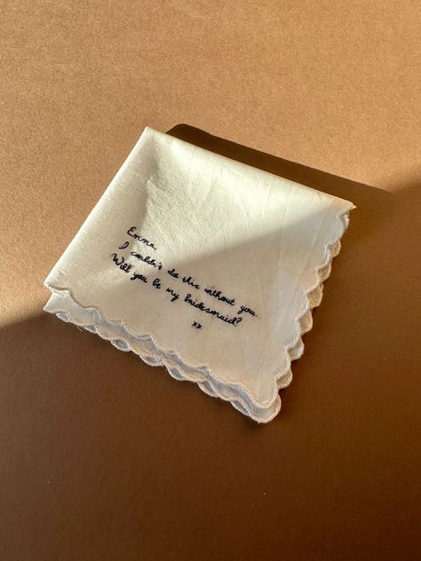 A pure cotton white scallop handkerchief hand embroidered with words of your choice, either in our handwriting font or your own handwriting. A sentimental and beautiful keepsake. If you want to use your own handwriting please send us a picture of your message in the layout you would like once an order has been placed. The embroidery will be in dark blue thread, let us know if would like to choose an alternative colour.  If you need a quicker delivery time or any adjustments please get in touch. Details: * Dimensions - 28cm x 28cm * 100% Cotton * Blue cotton thread * This item can be machine washed Wedding Embroidery Ideas, Sentimental Embroidery, Handkerchief Aesthetic, Embroidery Message, Embroidery Words, Embroidery Handkerchief, Handkerchief Embroidery, Embroidered Handkerchief Wedding, Gifts For Bridesmaids