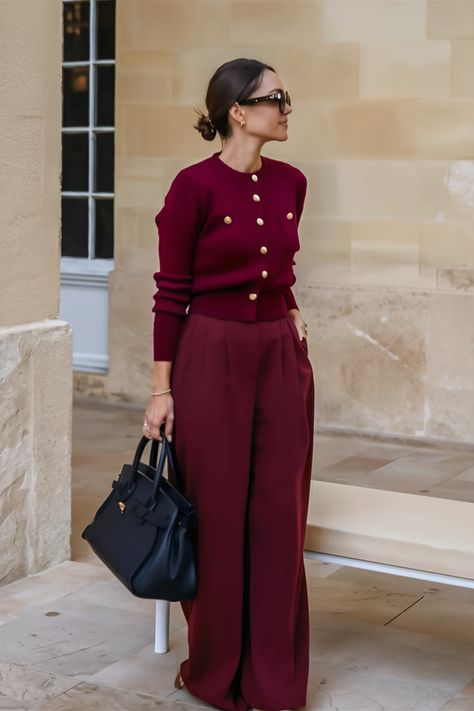 This striking outfit, entirely in shades of deep burgundy, offers a sophisticated yet bold statement. The coordinated colors enhance the wearer's silhouette, making it a stellar choice for those with an hourglass figure, as it highlights natural curves without overpowering. Burgundy Office Outfit, Burgundy Spring Outfit, Tomato Red Outfit, Classy Outfits For Women Over 40, Burgandy Outfits Aesthetic, Red Office Outfit, Red Work Outfit, Hourglass Figure Outfits Casual, Wine Red Outfit